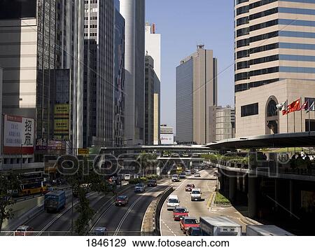 Traffic On Road In Central District; Hong Kong, China View Large Photo Image Stock Photo - Traffic On Road In Central District; Hong Kong, China. Fotosearch