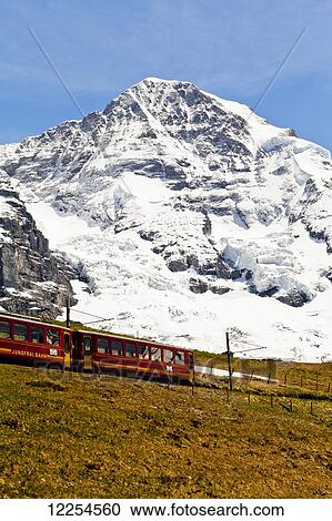 Stock Image - Train from Kleine Scheidegg to Jungfraujoch; Bernese Oberland, Switzerland. Fotosearch