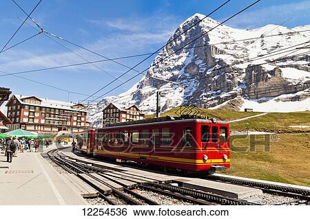 Stock Photograph - Train from Kleine Scheidegg to Jungfraujoch; Bernese Oberland, Switzerland. Fotosearch