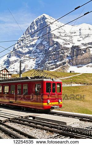 Stock Photography - Train from Kleine Scheidegg to Jungfraujoch; Bernese Oberland, Switzerland. Fotosearch