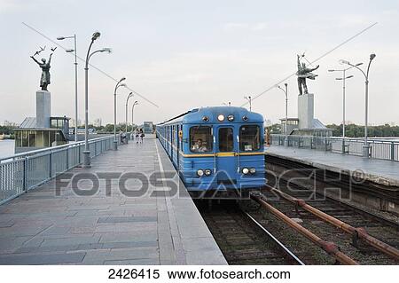 Train going over Metro bridge; Kiev, Ukraine View Large Photo Image Stock Photography - Train going over Metro bridge; Kiev, Ukraine. Fotosearch