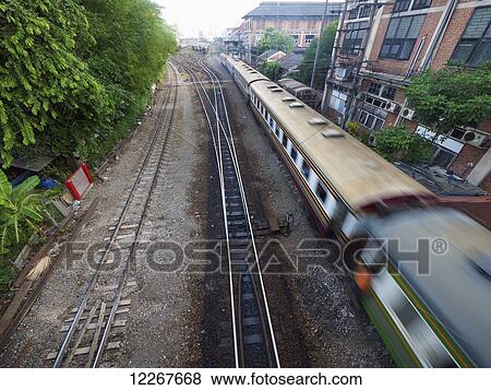 Train leaves Hua Lamphong Railway Station; Bangkok, Thailand View Large Photo Image Stock Photo - Train leaves Hua Lamphong Railway Station; Bangkok, Thailand. Fotosearch