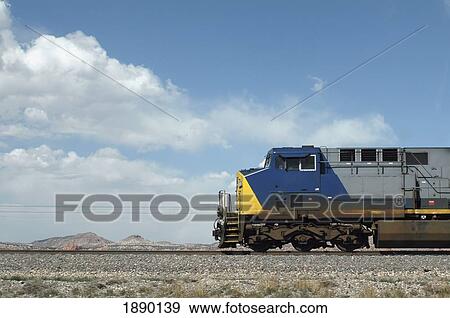 Train Passing Through Desert Landscape, Side View View Large Photo Image Stock Photo - Train Passing Through Desert Landscape, Side View. Fotosearch
