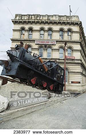 Stock Photo - Train sculpture in front of the Steampunk HQ; Oamaru, South Island, New Zealand. Fotosearch