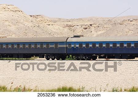 Train Travelling Along The Nile River Between Aswan And Edfu, Aswan, Egypt View Large Photo Image Stock Photograph - Train Travelling Along The Nile River Between Aswan And Edfu, Aswan, Egypt. Fotosearch