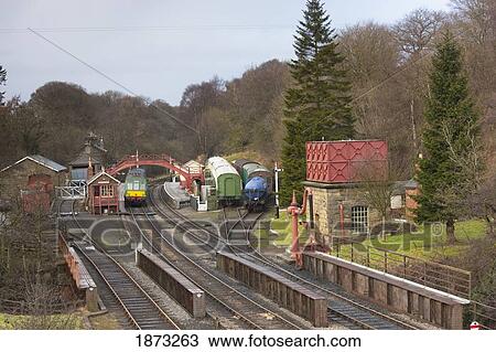 Trains On The Tracks And Switches; North Yorkshire, England View Large Photo Image Stock Image - Trains On The Tracks And Switches; North Yorkshire, England. Fotosearch