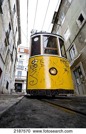 Tram Descending In A Narrow Street In Barrio Alto, Lisbon, Portugal, March'08 View Large Photo Image Stock Image - Tram Descending In A Narrow Street In Barrio Alto, Lisbon, Portugal, March'08. Fotosearch