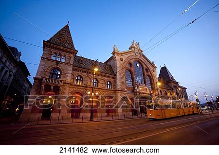 Tram Passing In Front Of Central Market Hall At Night, Budapest, Hungary View Large Photo Image Stock Image - Tram Passing In Front Of Central Market Hall At Night, Budapest, Hungary. Fotosearch
