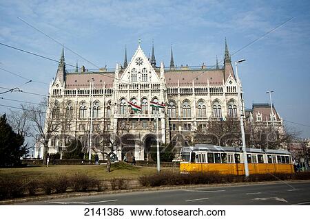 Tram Passing In Frony Of Hungary's Parliament, Budapest, Hungary View Large Photo Image Stock Photography - Tram Passing In Frony Of Hungary's Parliament, Budapest, Hungary. Fotosearch