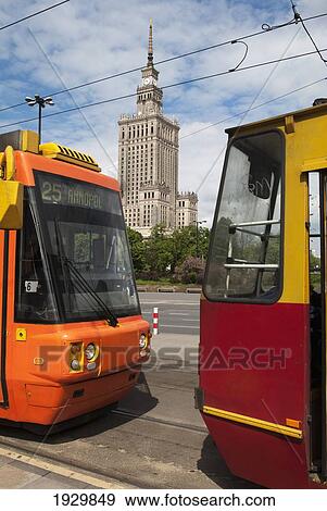 Trams passing the Communist era built Palace of Culture and Science building, Warsaw, Poland View Large Photo Image Stock Photo - Trams passing the Communist era built Palace of Culture and Science building, Warsaw, Poland. Fotosearch
