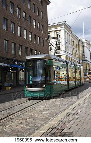 Stock Photography - Tramway Traveling By Buildings; Helsinki, Finland. Fotosearch