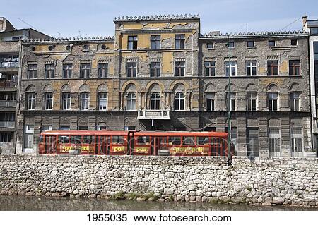 Tramway Travelling Along The Miljacka River, Sarajevo, Bosnia And Herzegovina View Large Photo Image Stock Photography - Tramway Travelling Along The Miljacka River, Sarajevo, Bosnia And Herzegovina. Fotosearch