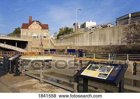 Stock Photo - Tranquil Scene On Erie Canal Locks And Old City Hall; Lockport, New York, Usa. Fotosearch