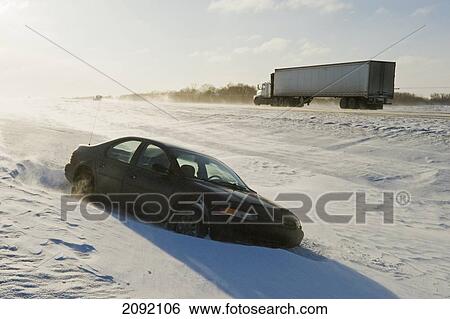 Trans-Canada Highway With Blowing Snow And Car In The Ditch; Winnipeg Manitoba Canada View Large Photo Image Stock Photograph - Trans-Canada Highway With Blowing Snow And Car In The Ditch; Winnipeg Manitoba Canada. Fotosearch