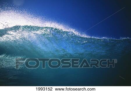 Translucent Wave, Spray, Blue Sky. View Large Photo Image Stock Image - Translucent Wave, Spray, Blue Sky.. Fotosearch