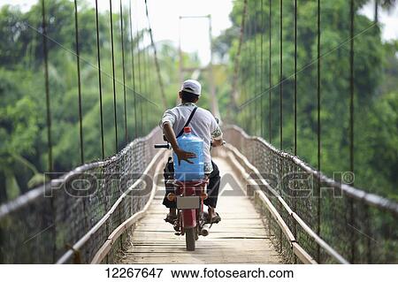 Transporting water; Battambang, Cambodia View Large Photo Image Stock Photo - Transporting water; Battambang, Cambodia. Fotosearch