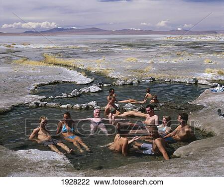 Travelers Bathing In Volcanic Springs. View Large Photo Image Stock Image - Travelers Bathing In Volcanic Springs.. Fotosearch
