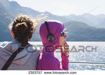 Travelers Enjoy The Scenic Cruise On A Ferry Across Lake Manapouri To Doubtful Sound; New Zealand View Large Photo Image Stock Photo - Travelers Enjoy The Scenic Cruise On A Ferry Across Lake Manapouri To Doubtful Sound; New Zealand. Fotosearch