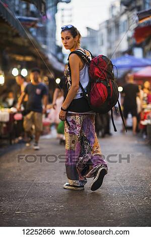 Stock Photograph - Traveling around Eighth Market of Xiamen, local spectacular Chinese street market full of tradition; Xiamen, Fujian, China. Fotosearch