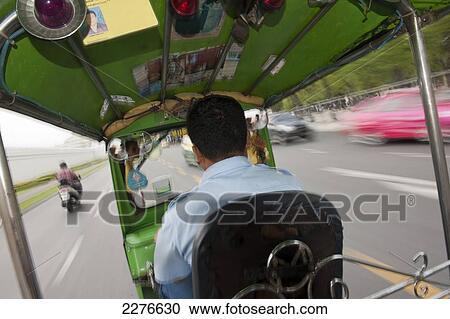Travelling in a Tuk-Tuk; Bangkok, Thailand View Large Photo Image Stock Image - Travelling in a Tuk-Tuk; Bangkok, Thailand. Fotosearch