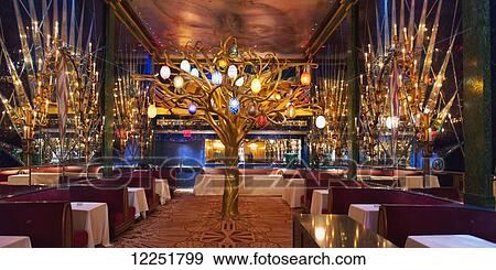 Tree sculpture inside a restaurant with formal dining; New York City, New York, United States of America View Large Photo Image Stock Photo - Tree sculpture inside a restaurant with formal dining; New York City, New York, United States of America. Fotosearch