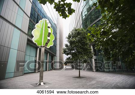 Tree sculpture set amongst the modern office buildings of MoreLondon near the River Thames and South Bank; London, England View Large Photo Image Picture - Tree sculpture set amongst the modern office buildings of MoreLondon near the River Thames and South Bank; London, England. Fotosearch