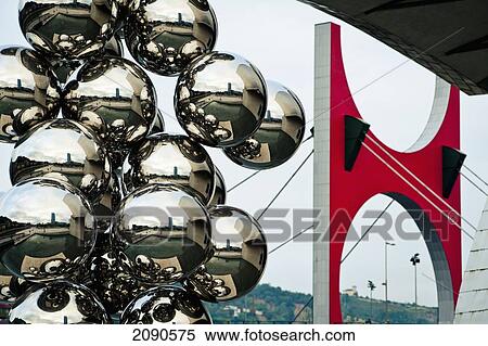 Stock Photography - Tree Tall Sculpture And Bridge In Front Of Guggenheim Museum, Bilbao, Basque Country, Spain. Fotosearch