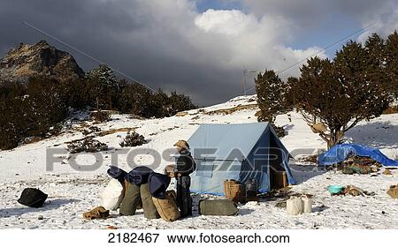 Stock Photo - Trekers On The Bumdra Wilderness, Trek Above The Paro Valley, Bhutan. Fotosearch