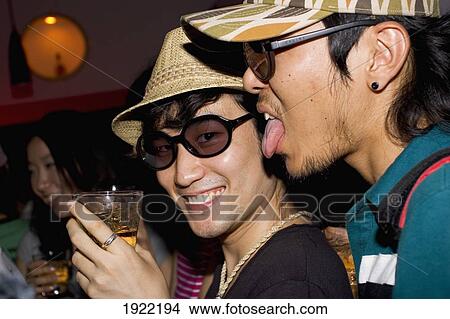 Picture - Trendy Guys In Tribeca Club. Fotosearch