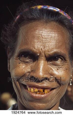 Picture - Tribe Woman Teeth Stained By Betel Nut. Fotosearch
