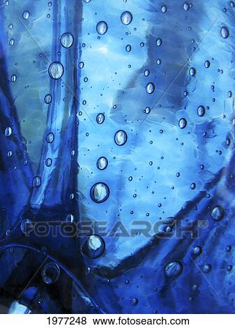 Trickster, Massachusetts, Seekonk, Caratunk Wildlife Refuge, Extreme Close-Up Of Water Droplets On Blue Surface. View Large Photo Image Stock Photo - Trickster, Massachusetts, Seekonk, Caratunk Wildlife Refuge, Extreme Close-Up Of Water Droplets On Blue Surface.. Fotosearch