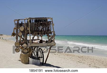 Stock Image - Trinket Cart On Varadero Beach; Varadero, Cuba. Fotosearch