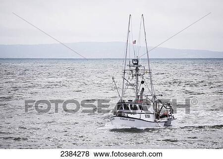 Troller entering Moss Landing Harbour area; Monterey Bay, California, United States of America View Large Photo Image Stock Photo - Troller entering Moss Landing Harbour area; Monterey Bay, California, United States of America. Fotosearch