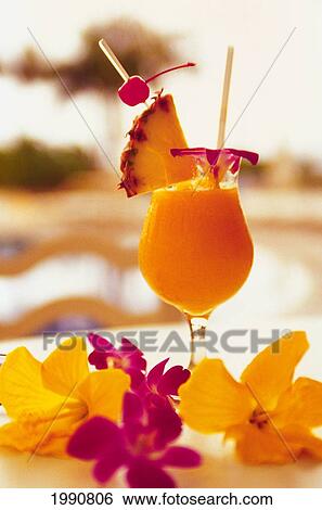Tropical Drink With Tropical Flowers View Large Photo Image Stock Photograph - Tropical Drink With Tropical Flowers. Fotosearch