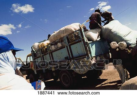 Stock Image - Truck Of Afghans Leaving Iran Under Unhcr Supervision. Fotosearch