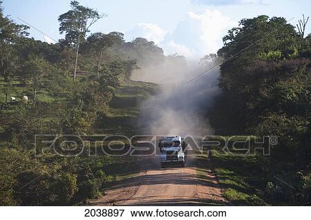 Truck On A Red Dirt Road Between Concepcion And Brazil In The Chiquitania A Region, Santa Cruz Department, Bolivia View Large Photo Image Stock Photo - Truck On A Red Dirt Road Between Concepcion And Brazil In The Chiquitania A Region, Santa Cruz Department, Bolivia. Fotosearch