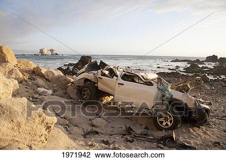 Stock Image - Truck Which Drove Over The Cliff By La Portada De Antofagasta, Antofagasta Region, Chile. Fotosearch