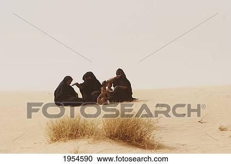 Tuareg women and children on a sand dune near Timbuktu, Mali View Large Photo Image Stock Image - Tuareg women and children on a sand dune near Timbuktu, Mali. Fotosearch