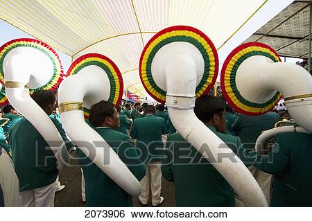 Stock Photograph - Tuba Players In A Marching Band In The Procession Of The Carnaval De Oruro, Oruro, Bolivia. Fotosearch