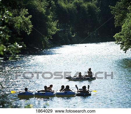 Stock Photo - Tubing, Elbow River, Calgary, Alberta, Canada. Fotosearch