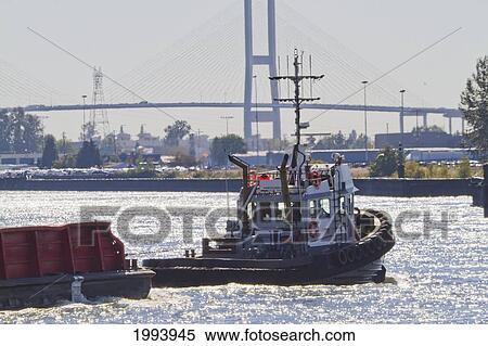 Stock Photography - Tug Boat Dock On The Fraser River, New Westminster, British Columbia, Canada. Fotosearch