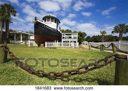 Tugboat F. D. Russell At Ponce Inlet Lighthouse; Daytona Beach, Florida, Usa View Large Photo Image Stock Image - Tugboat F. D. Russell At Ponce Inlet Lighthouse; Daytona Beach, Florida, Usa. Fotosearch