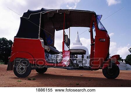 Tuk-Tuk At The Lankarama Dagoba View Large Photo Image Stock Photography - Tuk-Tuk At The Lankarama Dagoba. Fotosearch