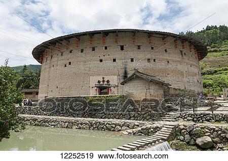 Tulou buildings from Hakka minority group were built eight centuries ago; Yongding, Fujian province, China View Large Photo Image Stock Photo - Tulou buildings from Hakka minority group were built eight centuries ago; Yongding, Fujian province, China. Fotosearch