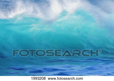 Stock Photo - Turbulent Turquoise Wave With Windspray, Blurred.. Fotosearch
