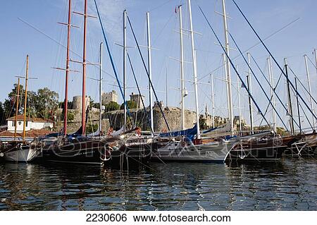 Turkey, Behind Is Bodrum Castle; Bodrum, Gulet Boats Lined Up In Harbour Of Bodrum Bay View Large Photo Image Stock Photograph - Turkey, Behind Is Bodrum Castle; Bodrum, Gulet Boats Lined Up In Harbour Of Bodrum Bay. Fotosearch