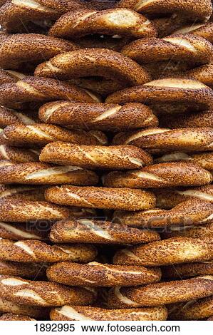 Stock Photography - Turkey, Detail of simit bread for sale; Istanbul. Fotosearch