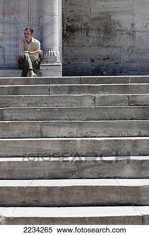 Turkey, Istanbul, Man Sitting By Blue Mosque; Sultanahmet View Large Photo Image Stock Photography - Turkey, Istanbul, Man Sitting By Blue Mosque; Sultanahmet. Fotosearch