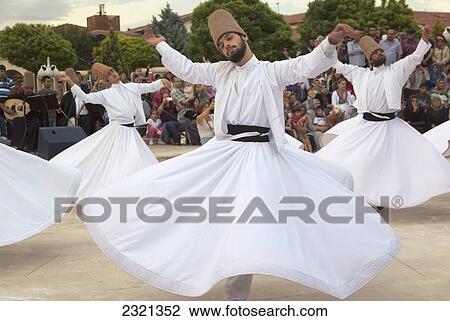 Stock Image - Turkey, Konya Province, Konya, Whirling Dervishes. Fotosearch
