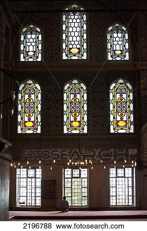 Stock Photo - Turkey, Man at prayer Inside Sultanahmet or Blue Mosque; Istanbul. Fotosearch